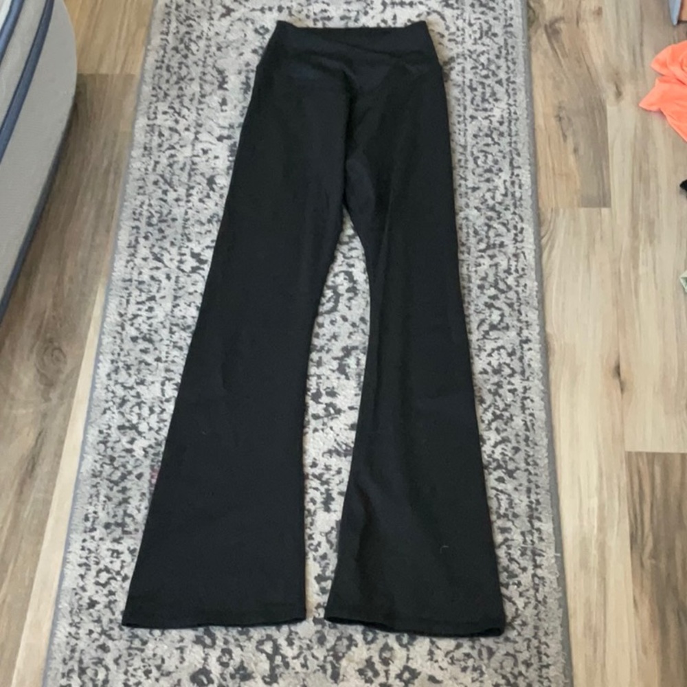 Black flare leggings with crossover waistband